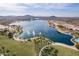 Lake and community park with fountains at 17581 W Canyon Ln, Goodyear, AZ 85338