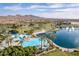 Community pool, lake, and mountain views at 17581 W Canyon Ln, Goodyear, AZ 85338