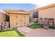 Large storage shed in backyard with brick patio and artificial turf at 17581 W Canyon Ln, Goodyear, AZ 85338