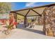 Stone Gazebo with picnic table in community park at 17581 W Canyon Ln, Goodyear, AZ 85338