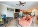 Open living space with fireplace and a view into the kitchen at 17581 W Canyon Ln, Goodyear, AZ 85338