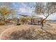 Community playground with shaded seating and BBQ at 17581 W Canyon Ln, Goodyear, AZ 85338