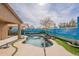 Relaxing pool area with painted beach scene at 17581 W Canyon Ln, Goodyear, AZ 85338