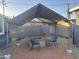 Outdoor patio with fire pit and seating under covered structure at 2118 E Oak St, Phoenix, AZ 85006