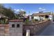 Charming house with a landscaped yard and modern block wall at 2118 E Oak St, Phoenix, AZ 85006