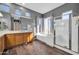 Well-lit bathroom featuring separate shower and tub, double vanity, and spacious layout at 22717 W Sierra Ridge Way, Wittmann, AZ 85361