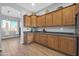 Modern kitchen featuring sleek appliances, ample cabinetry, and open layout at 22717 W Sierra Ridge Way, Wittmann, AZ 85361