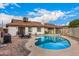 Refreshing pool and backyard area with chaise lounges, ideal for outdoor relaxation and entertaining at 2401 E Christy Dr, Phoenix, AZ 85028