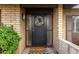 Front door of home with security screen and decorative wreath at 2401 E Christy Dr, Phoenix, AZ 85028