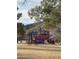 A playground designed for children, featuring climbing structures, slides, and recreational features at 2401 E Christy Dr, Phoenix, AZ 85028