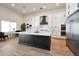 Spacious kitchen featuring a large island, modern appliances, and white cabinetry at 25232 S Pyrenees Ct, Queen Creek, AZ 85142