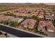 Aerial view of house and surrounding neighborhood at 26647 W Covey Ln, Buckeye, AZ 85396