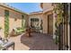 Charming courtyard with fountain and seating area at 26647 W Covey Ln, Buckeye, AZ 85396