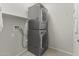 Stackable washer and dryer in a dedicated laundry room at 26861 W Adam Ave, Buckeye, AZ 85396