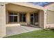 Covered patio with sliding glass doors and view of backyard at 26861 W Adam Ave, Buckeye, AZ 85396