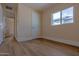 Simple bedroom with wood-look floors at 280 E Morelos St, Chandler, AZ 85225