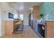 Modern kitchen with stainless steel appliances and hexagon tile at 280 E Morelos St, Chandler, AZ 85225