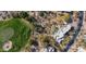 Aerial view showing home's location on golf course with pool and desert landscape at 3071 Ironwood Rd, Carefree, AZ 85377