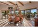 Elegant dining room featuring a large table and scenic views at 3071 Ironwood Rd, Carefree, AZ 85377