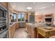 Spacious kitchen featuring granite countertops, stainless steel appliances, and ample cabinetry at 3071 Ironwood Rd, Carefree, AZ 85377