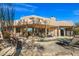 Relaxing pool area with flagstone patio and comfortable lounge chairs at 3071 Ironwood Rd, Carefree, AZ 85377