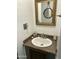 Small bathroom with vanity, sink, and ornate mirror at 3104 E Broadway -- # 88, Mesa, AZ 85204