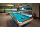 Game room featuring three billiard tables and comfortable seating at 3104 E Broadway -- # 88, Mesa, AZ 85204