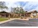 Elegant building entrance with stone columns and a covered driveway, creating a welcoming atmosphere at 3254 N Ladera Cir, Mesa, AZ 85207