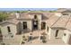 Beautiful home featuring desert landscaping, tile roof and large windows at 3254 N Ladera Cir, Mesa, AZ 85207