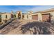 Luxurious home with a large paver driveway and attached garage at 3254 N Ladera Cir, Mesa, AZ 85207