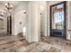 Elegant foyer showcasing travertine floors and a decorative front door at 3254 N Ladera Cir, Mesa, AZ 85207