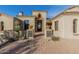 A stunning front entrance with stone planters lining the paved walkway at 3254 N Ladera Cir, Mesa, AZ 85207