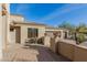 Beautiful home showcasing a three-car garage with stone planters at 3254 N Ladera Cir, Mesa, AZ 85207