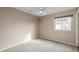 Well-lit bedroom with carpet flooring and a ceiling fan at 3404 E Los Altos Rd, Gilbert, AZ 85297