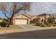 House exterior with a large tree and brick driveway at 3404 E Los Altos Rd, Gilbert, AZ 85297