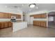 Bright kitchen with an island and wood cabinets at 3404 E Los Altos Rd, Gilbert, AZ 85297