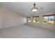 Living room features neutral wall colors and a view of the front entry at 3404 E Los Altos Rd, Gilbert, AZ 85297