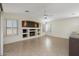 Living room with built-in entertainment center at 3404 E Los Altos Rd, Gilbert, AZ 85297