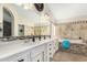 Elegant bathroom with a soaking tub and double vanity at 3450 N 67Th Dr, Phoenix, AZ 85033