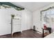 Bedroom with white dresser and built-in closet at 3450 N 67Th Dr, Phoenix, AZ 85033