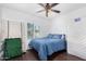 Guest bedroom with a double bed and ceiling fan at 3450 N 67Th Dr, Phoenix, AZ 85033