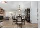 Elegant dining room with a large table and decorative china cabinet at 3450 N 67Th Dr, Phoenix, AZ 85033