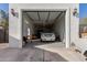 Garage with car and additional storage at 3450 N 67Th Dr, Phoenix, AZ 85033