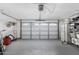 Two-car garage with overhead storage at 3450 N 67Th Dr, Phoenix, AZ 85033