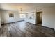 Bright dining room features wood-look floors and an open floor plan at 3748 W Rovey Ave, Phoenix, AZ 85019