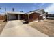 Charming brick ranch home with carport and well-maintained yard at 3748 W Rovey Ave, Phoenix, AZ 85019