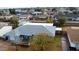 Aerial view of the house and surrounding neighborhood at 3813 W Glenn Dr, Phoenix, AZ 85051