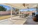 Covered patio with ceiling fans and outdoor seating at 3813 W Glenn Dr, Phoenix, AZ 85051