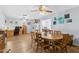 Dining room with wood table and chairs, offering ample space at 3813 W Glenn Dr, Phoenix, AZ 85051