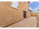 Back patio featuring a brick flooring and access to the house at 3883 E Santa Fe Ln, Gilbert, AZ 85297